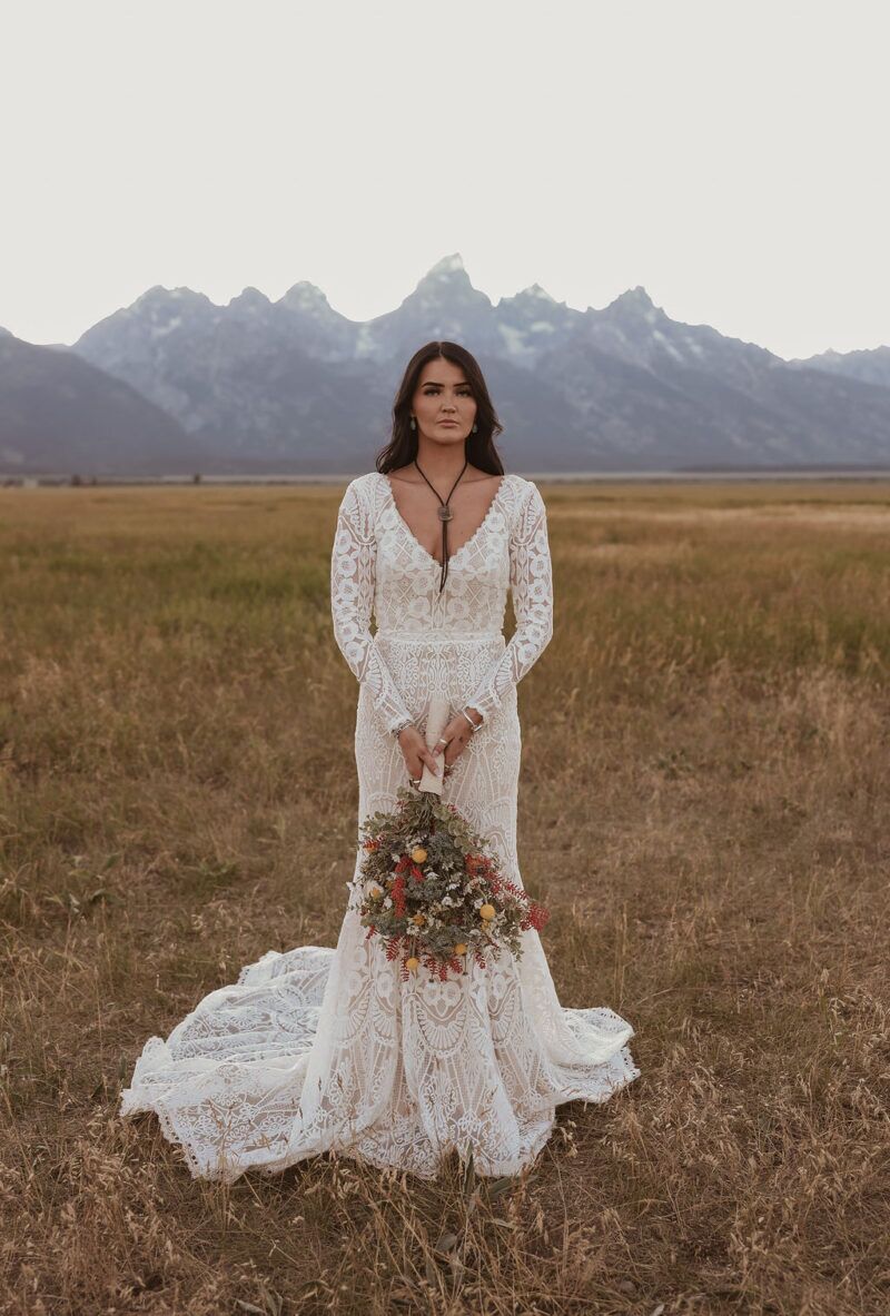 lace bohemian wedding dress Chic Boho Sexy V Neck Backless – TANYA BRIDAL inspiring cut that feels natural and secure The perfect balance of coverage and allure Inverted V Trim Mastery Signature inverted V trim work shapes the body beautifully Expert paneling creates flattering lines that enhance your silhouette Architectural detail that’s both functional and stunning Fitted construction with freedom to move Delicate Cotton Lace Story Lightweight cotton lace that moves with poetry in every step Ethereal patterns that feel modern yet timeless Breathable construction ensures all Short Sleeve Boho Wedding Dresses
